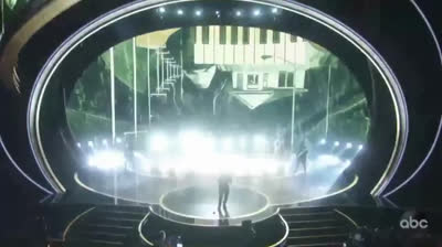 Eminem surprises at the Oscars with his rendition of "Lose Yourself"