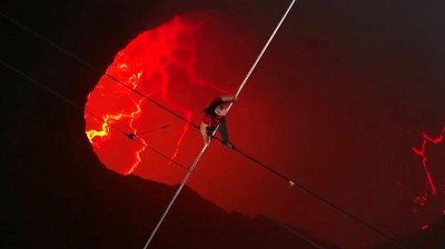 Cross an active volcano on a tightrope!