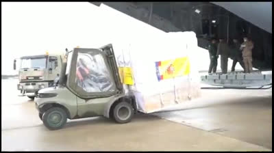 A plane arrives from China with 14 tons of medical equipment