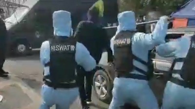 Método chino para "cazar" a infectados que no quieran cooperar