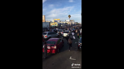 Stampede of people escaping from police cargo