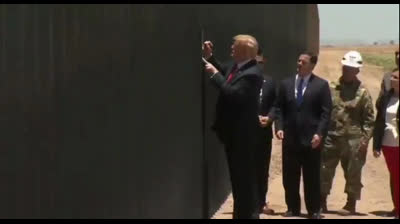 President Trump signs the border wall