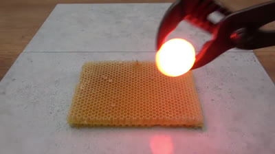 Metal ball at 1000 degrees on honeycomb