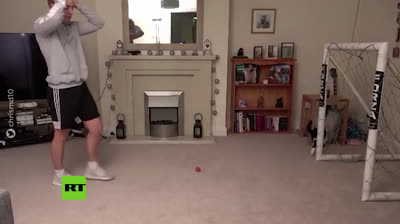 Is it a cat or a football goalkeeper?