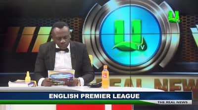 African journalist telling soccer results