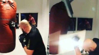 Tyson Fury drops his roof boxing at home